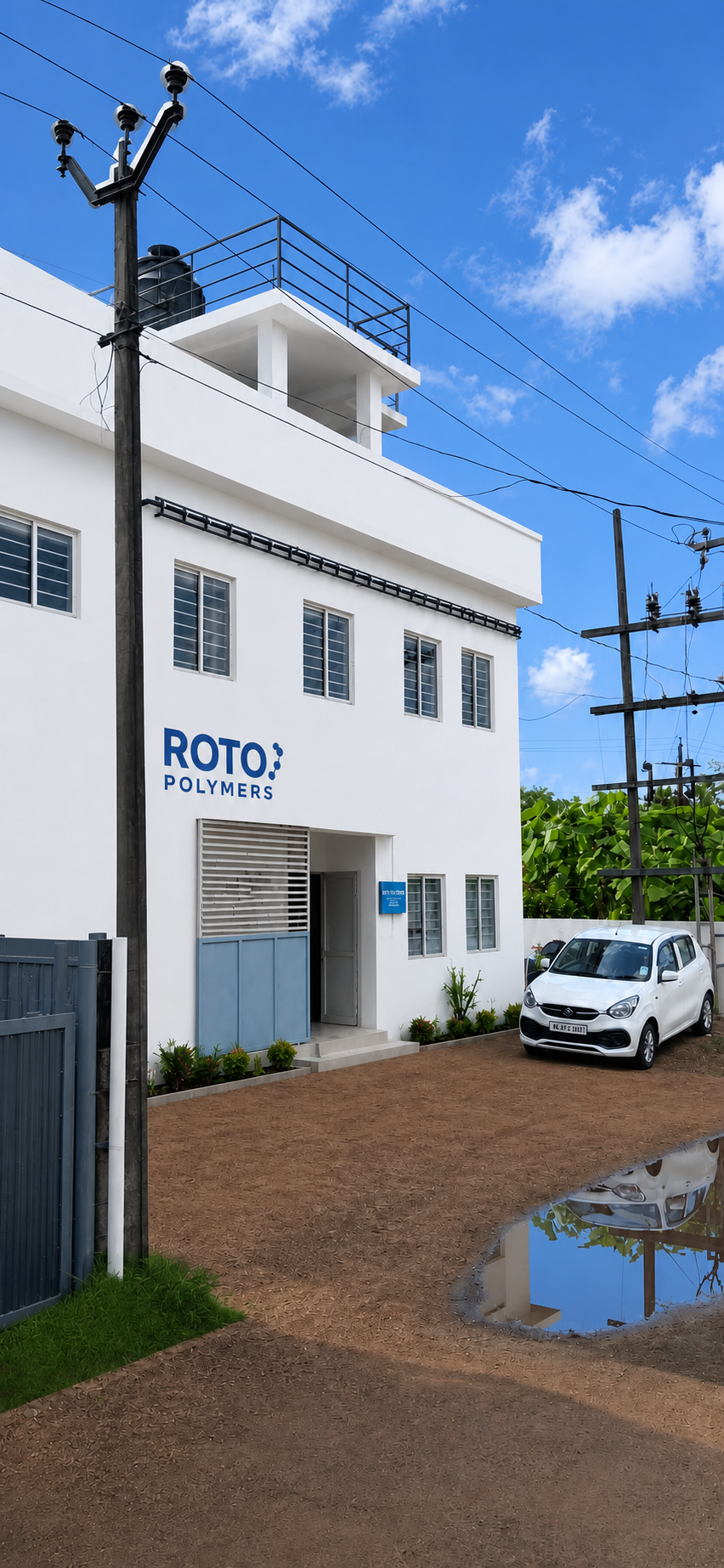 Cleaned Roto Polymers factory building in Kunnamthanam, Kerala with the company logo integrated on the wall